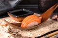 Delicious Sushi Nigiri with Salmon. Dish decorated with a sprig of cherry blossoms. Royalty Free Stock Photo