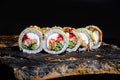 Delicious Sushi Roll on a stone Plate Royalty Free Stock Photo