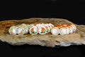 Delicious Sushi Roll on a stone Plate Royalty Free Stock Photo