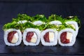 Delicious sushi rolls with tuna, avocado and cream cheese, decor Royalty Free Stock Photo
