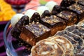 Delicious sweet black and white cake at a wedding with a purple background Royalty Free Stock Photo