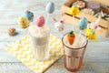 Delicious sweet cake pops for Easter celebration on wooden table Royalty Free Stock Photo