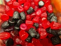 Delicious sweet sweet candy red black colors closeup