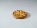 Delicious and sweet crunchy brown biscuit agains white background