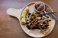 Delicious sweet dessert : homemade waffle with chocolate sauce ,