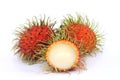 Delicious sweet fruit rambutan isolated on white background, peeled rambutan reveals white fruit pulp inside Royalty Free Stock Photo