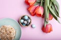 Delicious sweet homemade easter cake, tulips and eggs, top view Royalty Free Stock Photo