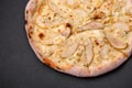 Delicious sweet pizza with pear, dorblu cheese and nuts Royalty Free Stock Photo