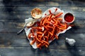 Delicious sweet potato fries and sauces on table Royalty Free Stock Photo