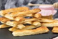 Delicious and sweet puff pastry sticks with cinnamon Royalty Free Stock Photo