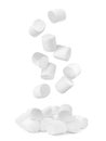 Delicious sweet puffy marshmallows flying on white background Royalty Free Stock Photo