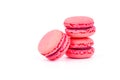 Delicious and sweet raspberry flavor macaron or macaroon, special famous dessert isolated Royalty Free Stock Photo