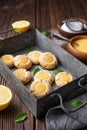 Delicious sweet snack, lemon crud thumbprint cookies sprinkled with powdered sugar Royalty Free Stock Photo