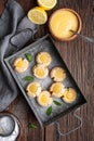 Delicious sweet snack, lemon crud thumbprint cookies sprinkled with powdered sugar Royalty Free Stock Photo