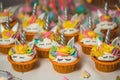 Delicious sweets on candy buffet. Lot of colorful desserts on table