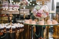 Delicious sweets on candy buffet. Table with sweets, buffet with cupcakes, Macaroons, candies, dessert Royalty Free Stock Photo