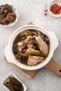 Delicious Taiwanese peeled green chili pepper chicken soup with mushroom and goji berry