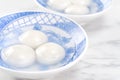 Delicious tang yuan, yuanxiao in a small bowl. Asian traditional festive food rice dumplings ball with stuffed fillings for