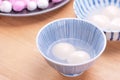 Delicious tang yuan, yuanxiao in a small bowl. Traditional festive food rice dumplings ball with stuffed fillings for Chinese