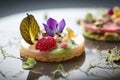 Delicious tartlet with fresh berries and edible flowers on a plate. Generative AI
