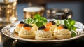 Delicious tartlets with cheese cream and black and red caviar Royalty Free Stock Photo