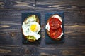 Delicious Tasty Avocado Eggs and Tomato Cheese Toasts Royalty Free Stock Photo