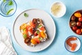 Delicious and tasty sandwich with salmon, basil, cherry tomatoes and caper. Close up selective focus. Traditional Royalty Free Stock Photo