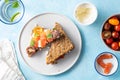 Delicious and tasty sandwich with salmon, basil, cherry tomatoes and caper. Close up selective focus. Traditional Royalty Free Stock Photo