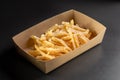 Delicious, tasty french fries topping with Parmesan cheese. Deep fry potato or appetizer, fast food. Dish of crisp Royalty Free Stock Photo