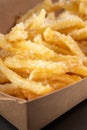 Delicious, tasty french fries topping with Parmesan cheese. Deep fry potato or appetizer, fast food. Dish of crisp Royalty Free Stock Photo