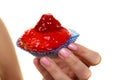 Delicious tasty sweet cake cupcake in human hand. Royalty Free Stock Photo