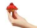 Delicious tasty sweet cake cupcake in human hand. Royalty Free Stock Photo