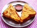 Bread pakora fritters with red sauce