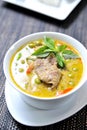 Delicious thai food: green curry in a bowl