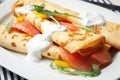 Delicious thin pancakes with salmon and sour cream on plate Royalty Free Stock Photo