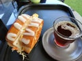 Delicious toast cheese bread with vold brew arabica Coffee