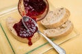 Delicious toast with jam on table close-up.