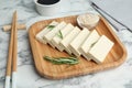 Delicious tofu with rosemary served on white marble table Royalty Free Stock Photo