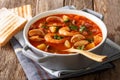 Delicious tomato chowder soup with shellfish and bacon clos Royalty Free Stock Photo