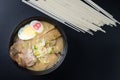 Delicious tonkotsu ramen, Japanese noodle in pork Bone based soup topped with chashu pork, boiled egg, pickled bamboo shoot