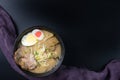 Delicious tonkotsu ramen, Japanese noodle in pork Bone based soup topped with chashu pork, boiled egg, pickled bamboo shoot