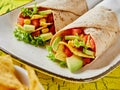 Delicious tortilla wraps with avocado and nachos Royalty Free Stock Photo