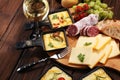 Delicious traditional Swiss melted raclette cheese on diced boil