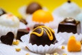 Delicious truffles on yellow background