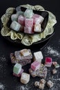 Delicious,Turkish Delight in stylish black plate set. Royalty Free Stock Photo