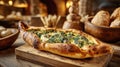 Delicious Turkish Pide with spinach and cheese, freshly baked Royalty Free Stock Photo