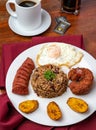 Delicious typical Costa Rican breakfast with coffee gallo pinto Royalty Free Stock Photo