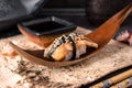 Delicious Unagi Eel Nigiri Sushi Eel Sushi . Dish decorated with a sprig of cherry blossoms. Royalty Free Stock Photo