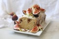 Delicious vanilla bean Tea Cake with cinnamon-hazelnut crumble, glazed with mascarpone vanilla cream topped with fresh harvested f Royalty Free Stock Photo