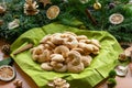 Vanilla crescents in front of a arrangement of fir branches Royalty Free Stock Photo